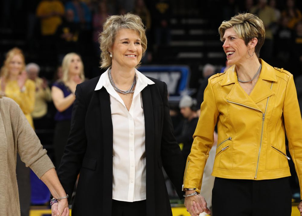Iowa Hawkeyes head coach Lisa Bluder watches as her daughter Emma sings the National Anthem before the Iowa Hawkeyes game against the Northwestern Wildcats Sunday, March 3, 2019 at Carver-Hawkeye Arena. (Brian Ray/hawkeyesports.com)