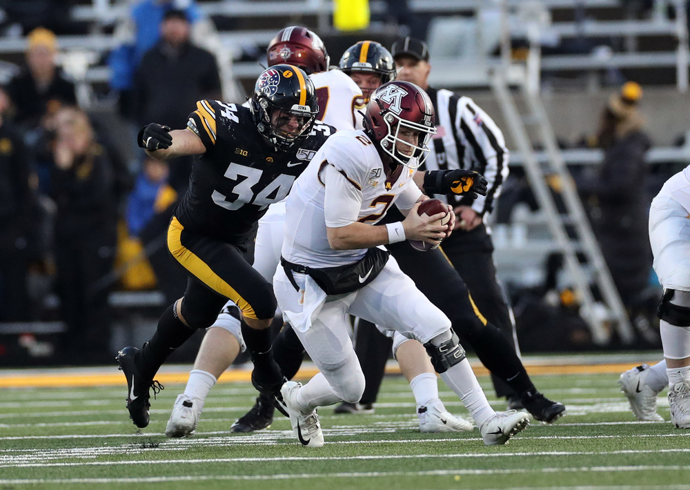 Iowa Hawkeyes linebacker Kristian Welch (34) gets a sack against the Minnesota Golden Gophers Saturday, November 16, 2019 at Kinnick Stadium. (Brian Ray/hawkeyesports.com)