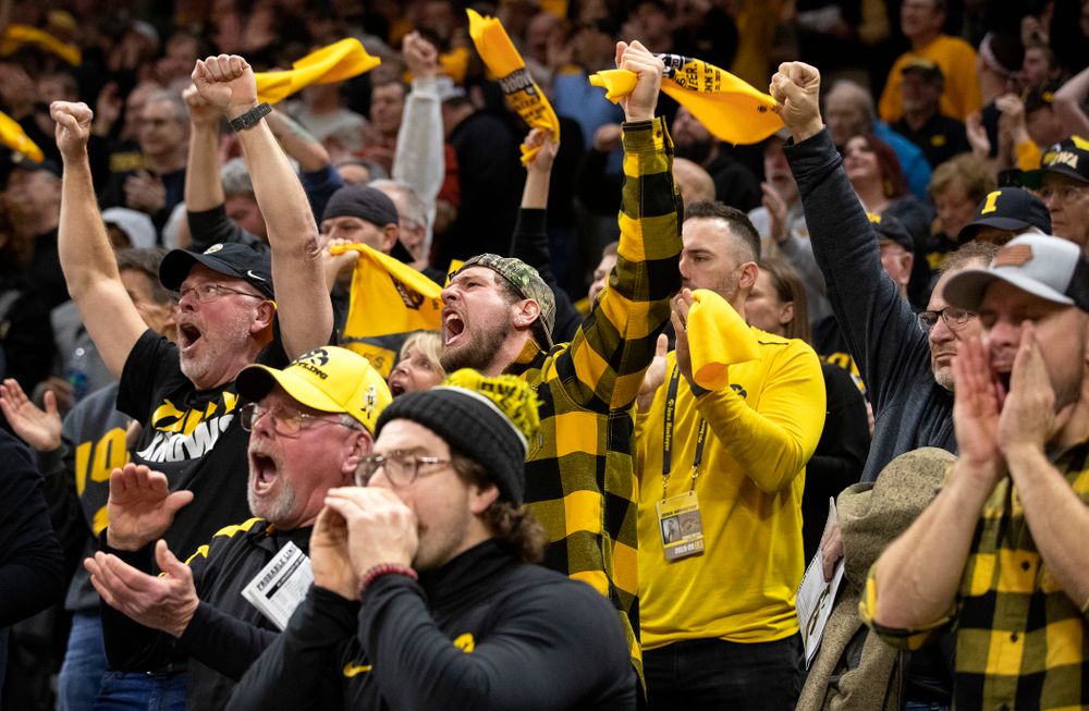 Iowa fans celebrate as Michael Kemerer defeats Penn State’s Mark Hall in his 174-pound match during their dual at Carver-Hawkeye Arena in Iowa City on Friday, January 31, 2020. (Stephen Mally/hawkeyesports.com)