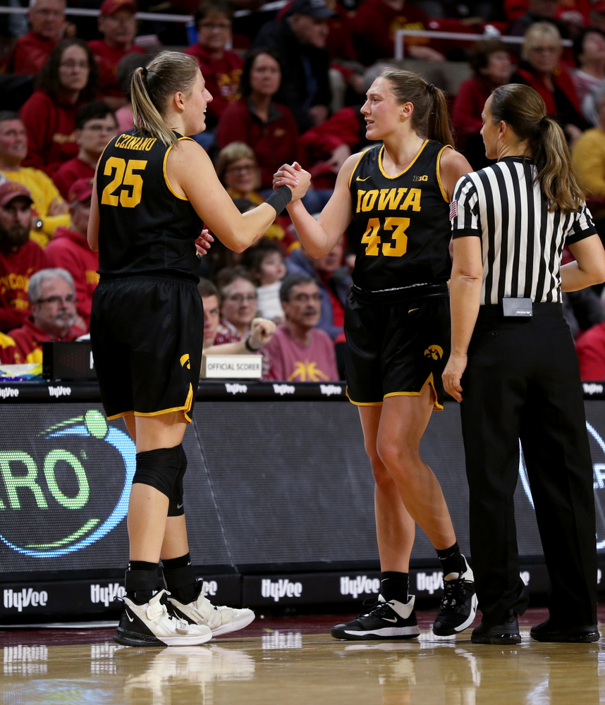 Iowa Hawkeyes forward/center Monika Czinano (25) and forward Amanda Ollinger (43) against the Iowa State Cyclones Wednesday, December 11, 2019 at Hilton Coliseum in Ames, Iowa(Brian Ray/hawkeyesports.com)