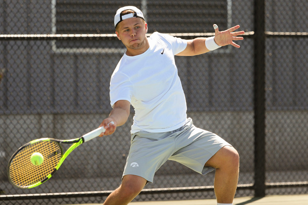 Iowa's Will Davies during his match against Michigan at the Hawkeye Tennis and Recreation Complex in Iowa City on Sunday, Apr. 21, 2019. (Stephen Mally/hawkeyesports.com)