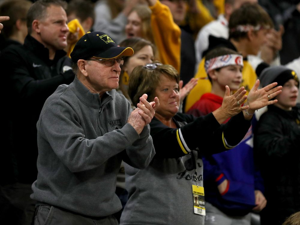 Former Head Coach Dan Gable claps as Iowa’s Michael Kemerer wrestles Penn State’s Mark Hall at 174 pounds Friday, January 31, 2020 at Carver-Hawkeye Arena. Kemerer won the match 11-6. (Brian Ray/hawkeyesports.com)
