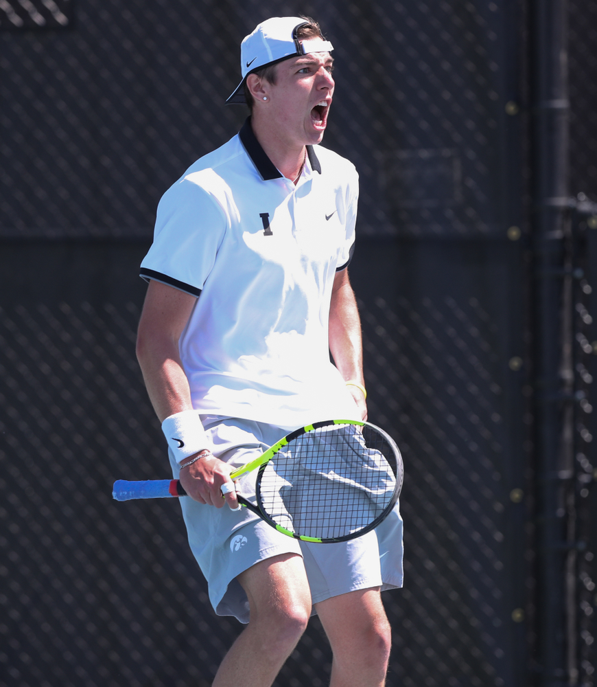 IowaÕs Joe Tyler and Nikita Snezhko play a doubles match against the Michigan Wolverines Sunday, April 21, 2019 at the Hawkeye Tennis and Recreation Complex. (Brian Ray/hawkeyesports.com)