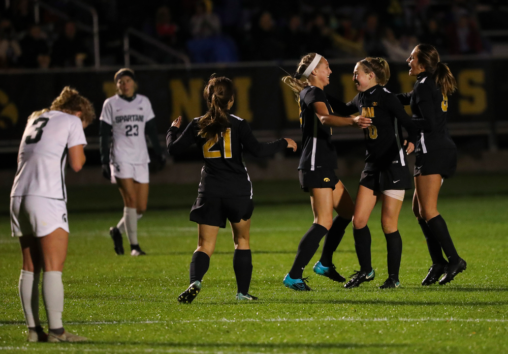 Iowa Hawkeyes midfielder Hailey Rydberg (2), Iowa Hawkeyes midfielder Natalie Winters (10) and Iowa Hawkeyes midfielder Isabella Blackman (6) celebrate after Rydberg's goal during a game against Michigan State at the Iowa Soccer Complex on October 12, 2018. (Tork Mason/hawkeyesports.com)