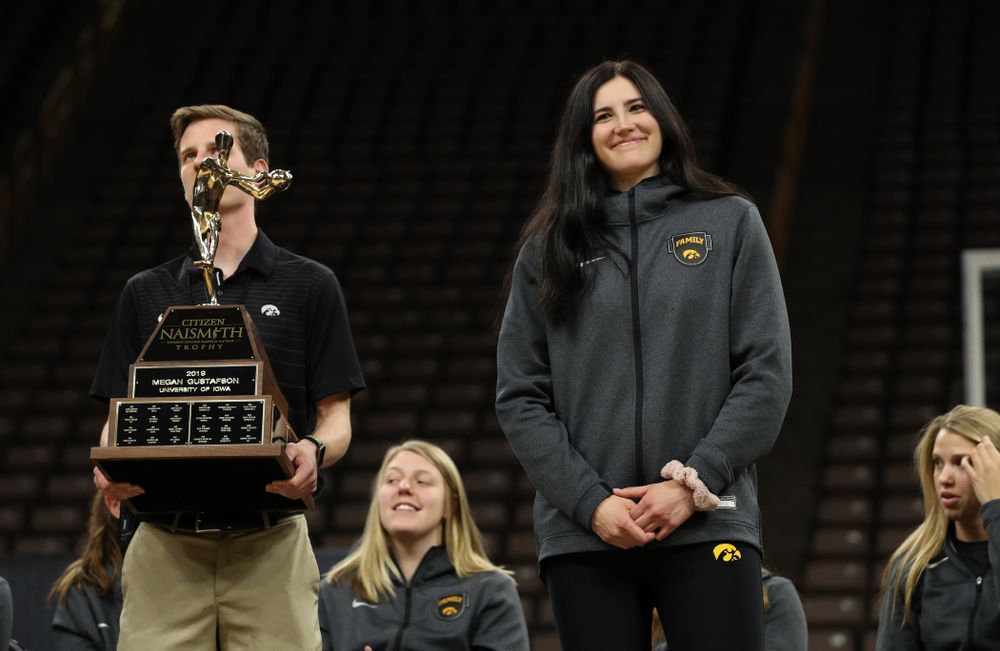 Iowa Hawkeyes forward Megan Gustafson (10) is presented with the Naismith Player Of The Year Trophy during the teamÕs Celebr-Eight event Wednesday, April 24, 2019 at Carver-Hawkeye Arena. (Brian Ray/hawkeyesports.com)
