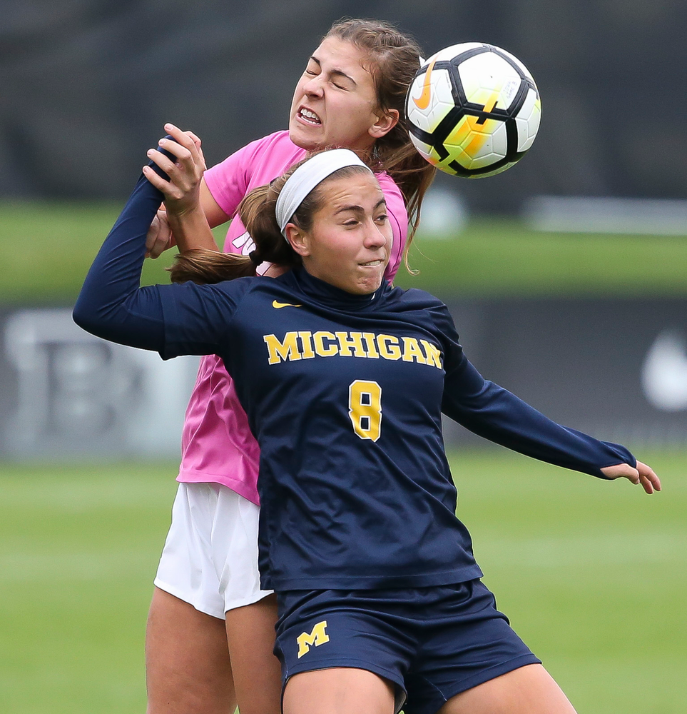 Iowa Hawkeyes defender Hannah Drkulec (17) heads the ball during a game against Michigan at the Iowa Soccer Complex on October 14, 2018. (Tork Mason/hawkeyesports.com)