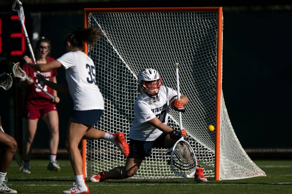 STANFORD, California - FEBRUARY 14: Virginia Cavaliers goalkeeper Charlie Campbell (27) makes a save against the Stanford Cardinal during the first half at Cagan Stadium on February 14, 2020 in Stanford, California. The Virginia Cavaliers defeated the Stanford Cardinal 12-11. (Photo by Jason O. Watson)