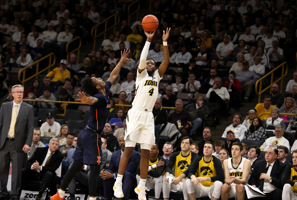 Iowa Hawkeyes guard Isaiah Moss (4) knocks down a three point basket against the Illinois Fighting Illini Sunday, January 20, 2019 (Brian Ray/hawkeyesports.com)
