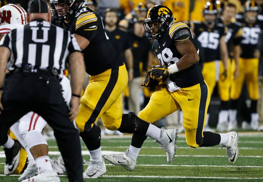 Iowa Hawkeyes running back Toren Young (28) runs the ball during a game against Wisconsin at Kinnick Stadium on September 22, 2018. (Tork Mason/hawkeyesports.com)