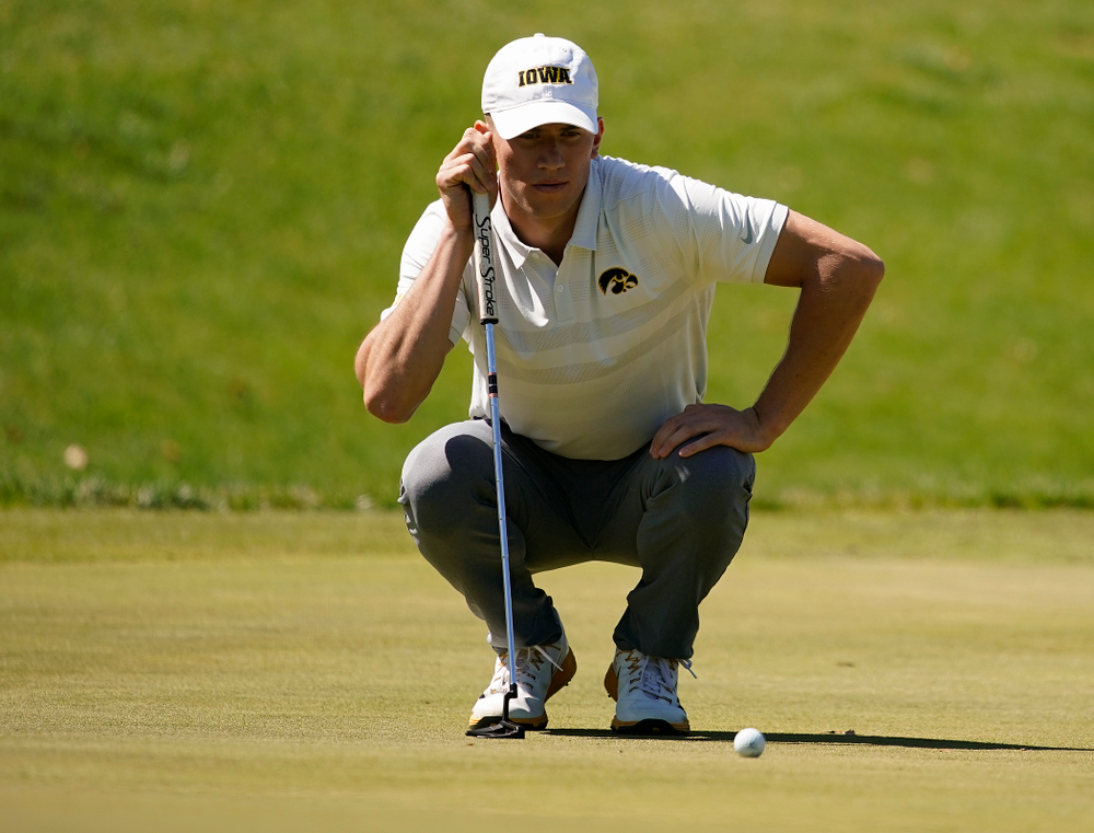 Iowa's Aaron DeNucci lines up a putt during the second round of the Hawkeye Invitational at Finkbine Golf Course in Iowa City on Saturday, Apr. 20, 2019. (Stephen Mally/hawkeyesports.com)