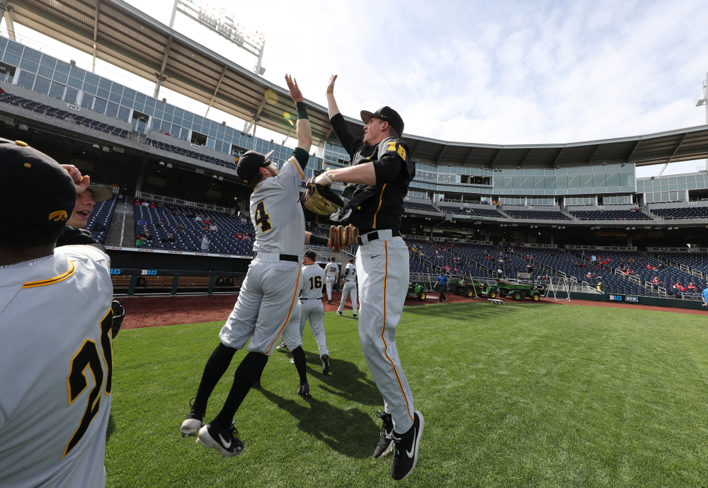 Iowa Hawkeyes infielder Mitchell Boe (4) and Shane Ritter (18) against the Indiana Hoosiers in the first round of the Big Ten Baseball Tournament Wednesday, May 22, 2019 at TD Ameritrade Park in Omaha, Neb. (Brian Ray/hawkeyesports.com)