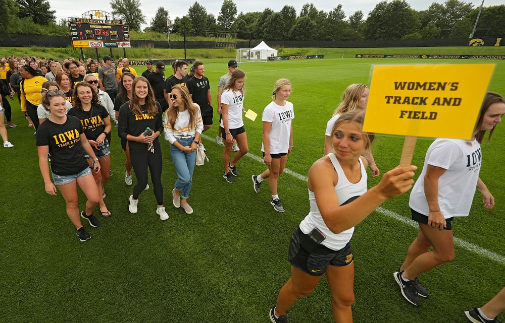 Student-athletes walk in the Parade of Champions during the Student-Athlete Kickoff at the Iowa Soccer Complex in Iowa City on Sunday, Aug 25, 2019. (Stephen Mally/hawkeyesports.com)