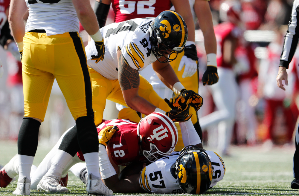 Iowa Hawkeyes defensive end A.J. Epenesa (94) and defensive end Chauncey Golston (57) against the Indiana Hoosiers Saturday, October 13, 2018 at Memorial Stadium, in Bloomington, Ind. (Brian Ray/hawkeyesports.com)