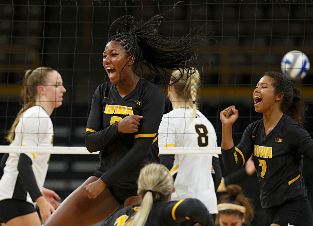 Iowa’s Amiya Jones (9) and Brie Orr (7) celebrate during the first set of the Black and Gold scrimmage at Carver-Hawkeye Arena in Iowa City on Saturday, Aug 24, 2019. (Stephen Mally/hawkeyesports.com)