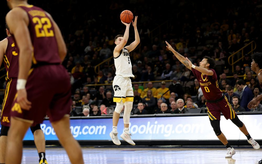 Iowa Hawkeyes guard CJ Fredrick (5) against the Minnesota Golden Gophers Monday, December 9, 2019 at Carver-Hawkeye Arena. (Brian Ray/hawkeyesports.com)