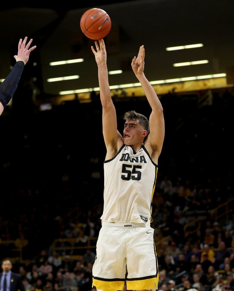 Iowa Hawkeyes forward Luka Garza (55) knocks down a three point basket against the Michigan Wolverines Friday, January 17, 2020 at Carver-Hawkeye Arena. (Brian Ray/hawkeyesports.com)