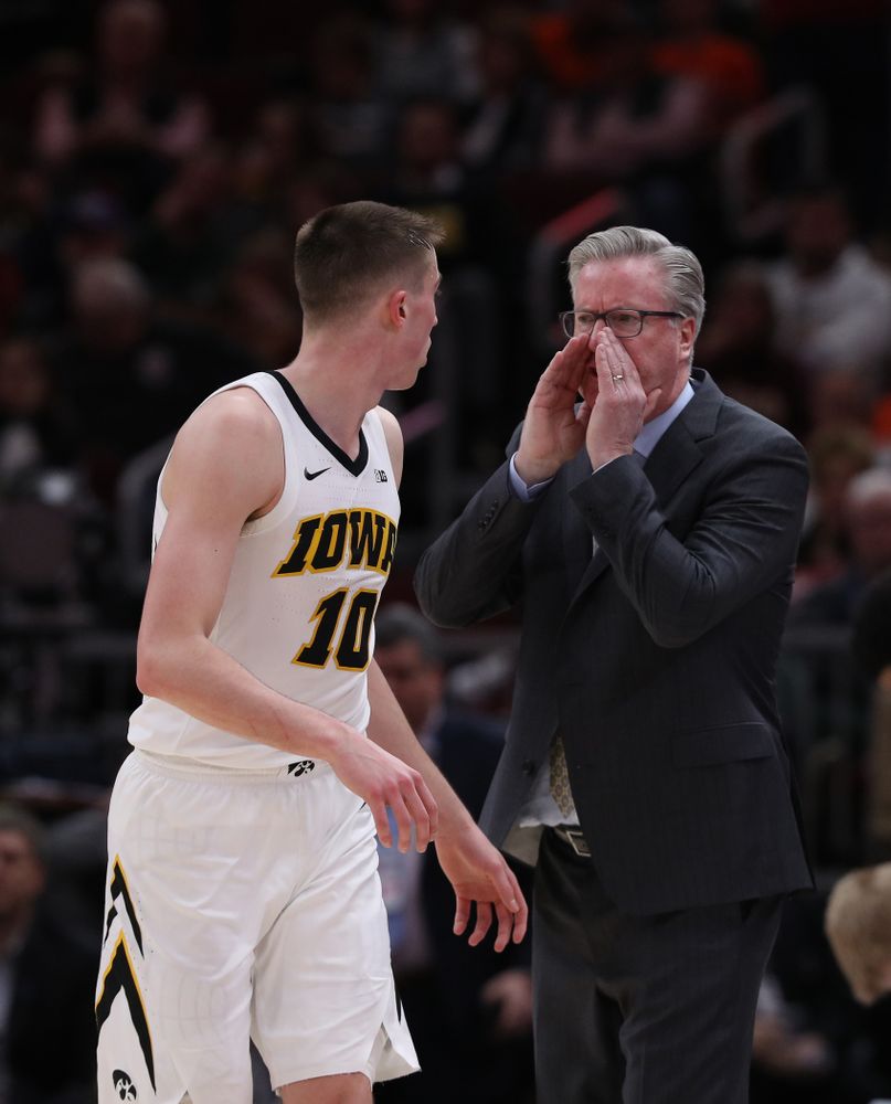 Iowa Hawkeyes head coach Fran McCaffery and guard Joe Wieskamp (10) against the Illinois Fighting Illini in the 2019 Big Ten Men's Basketball Tournament Thursday, March 14, 2019 at the United Center in Chicago. (Brian Ray/hawkeyesports.com)