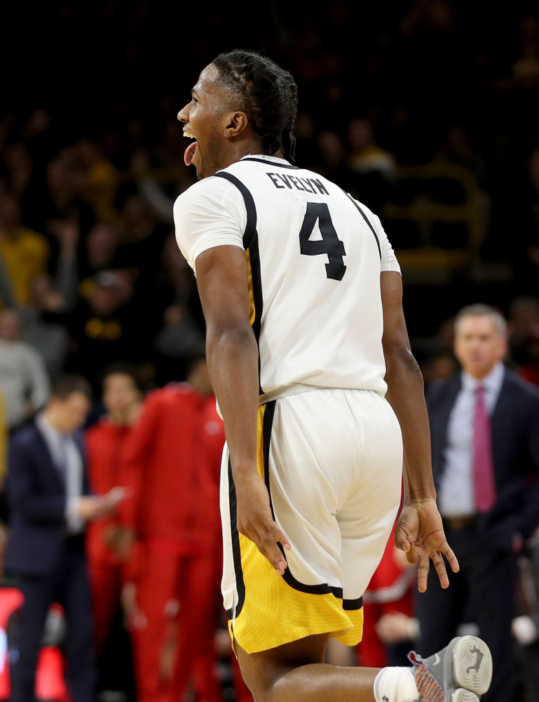 Iowa Hawkeyes guard Bakari Evelyn (4) celebrates a three point basket against the Ohio State Buckeyes Thursday, February 20, 2020 at Carver-Hawkeye Arena. (Brian Ray/hawkeyesports.com)