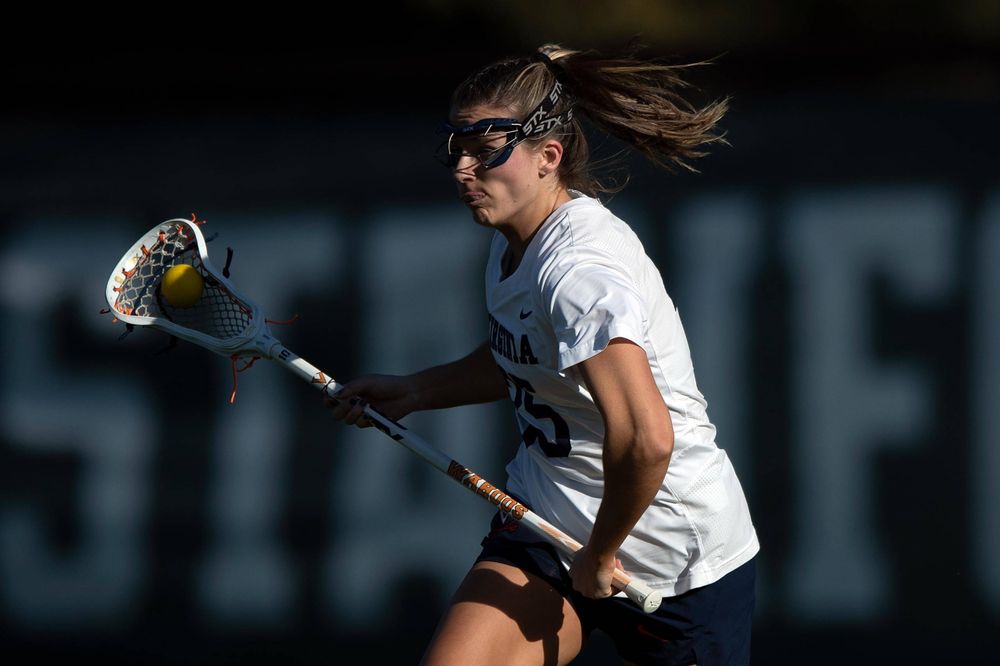 STANFORD, California - FEBRUARY 14: Virginia Cavaliers defense Lauren Martin (35) carries the ball up field against the Stanford Cardinal during the first half at Cagan Stadium on February 14, 2020 in Stanford, California. The Virginia Cavaliers defeated the Stanford Cardinal 12-11. (Photo by Jason O. Watson)
