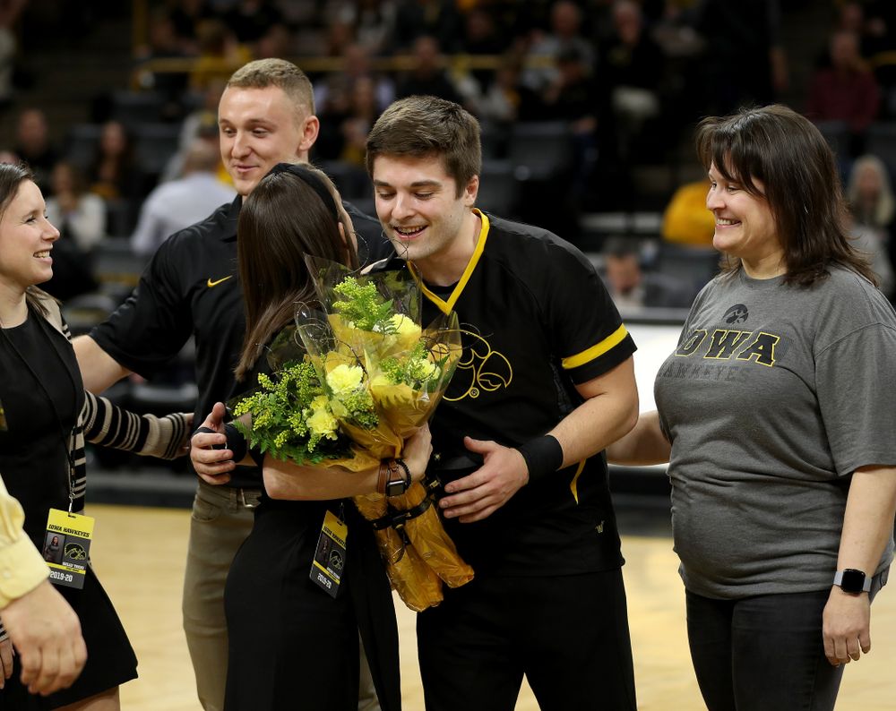 The Iowa Cheerleaders and Dance Team perform on senior night at half-time of the Iowa Hawkeyes game against the Purdue Boilermakers Tuesday, March 3, 2020 at Carver-Hawkeye Arena. (Brian Ray/hawkeyesports.com)