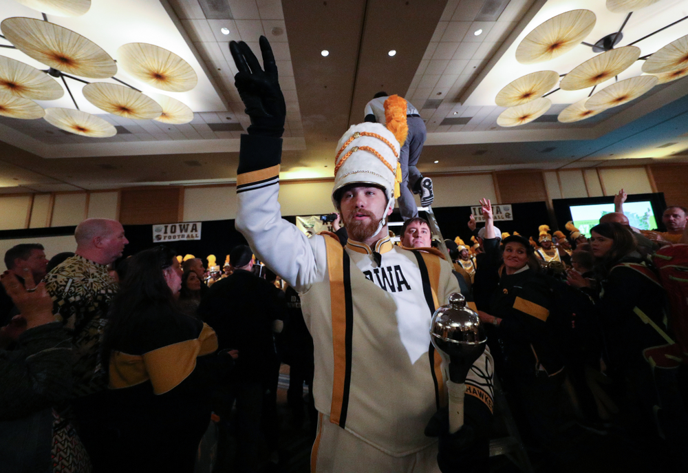 The Hawkeye Marching Band and the Iowa Spirit Squads perform during the Holiday Bowl Hawkeye Huddle Thursday, December 26, 2019 at the Hilton in downtown San Diego. (Brian Ray/hawkeyesports.com)