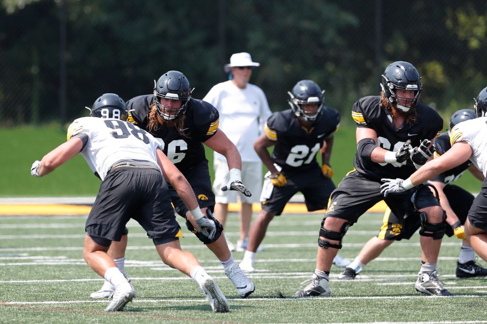 Iowa Hawkeyes offensive lineman Levi Paulsen (66) and offensive lineman Landan Paulsen (68) during practice No. 7 of fall camp Friday, August 10, 2018 at the Kenyon Football Practice Facility. (Brian Ray/hawkeyesports.com)
