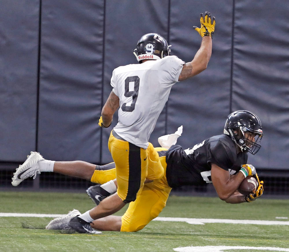 Dominique Dafney, Geno Stone -- University of Iowa spring football practice No. 6 on March 31, 2018, in Iowa City, Iowa. (Darren Miller/hawkeyesports.com)