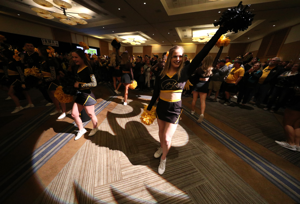 The Hawkeye Marching Band and the Iowa Spirit Squads perform during the Holiday Bowl Hawkeye Huddle Thursday, December 26, 2019 at the Hilton in downtown San Diego. (Brian Ray/hawkeyesports.com)