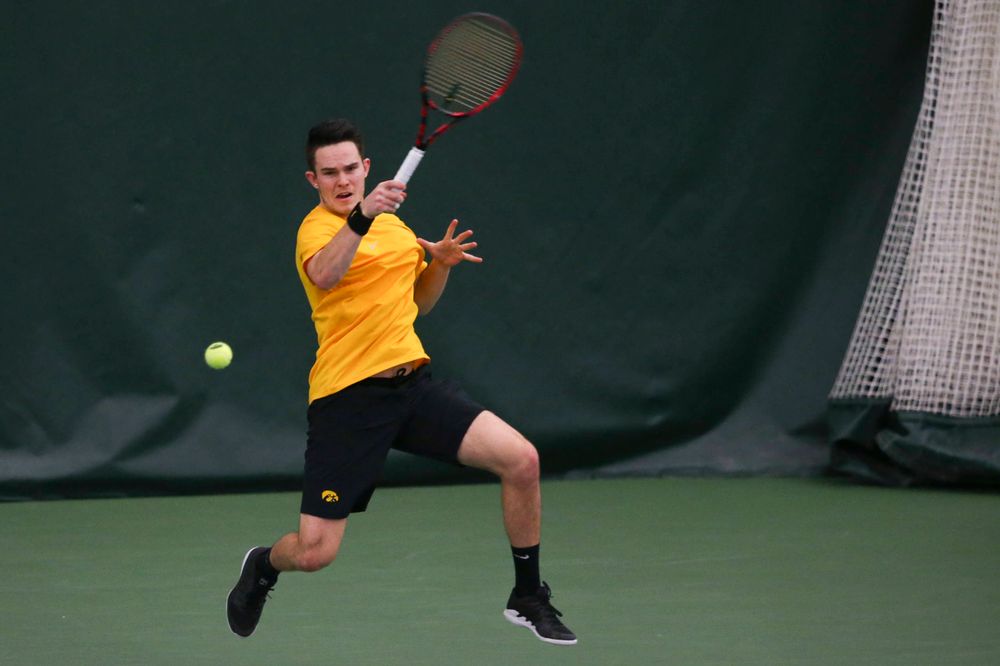 Iowa's Jonas Larsen at a tennis match vs Drake Friday, March 8, 2019 at the Hawkeye Tennis and Recreation Complex. (Lily Smith/hawkeyesports.com)