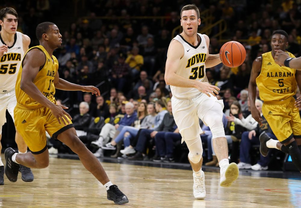 Iowa Hawkeyes guard Connor McCaffery (30) dribbles the ball during a game against Alabama State at Carver-Hawkeye Arena on November 21, 2018. (Tork Mason/hawkeyesports.com)