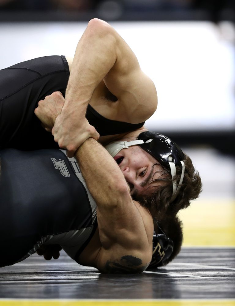 Iowa's Austin DeSanto wrestles Purdue's Ben Thornton at 133 pounds Saturday, November 24, 2018 at Carver-Hawkeye Arena. (Brian Ray/hawkeyesports.com)