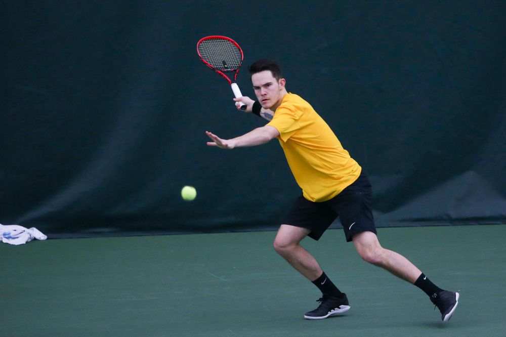 Iowa's Jonas Larsen at a tennis match vs Drake Friday, March 8, 2019 at the Hawkeye Tennis and Recreation Complex. (Lily Smith/hawkeyesports.com)