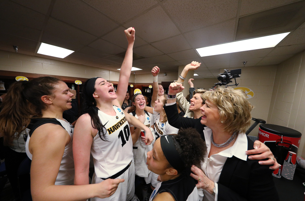 Iowa Hawkeyes forward Megan Gustafson (10) and head coach Lisa Bluder against the NC State Wolfpack in the regional semi-final of the 2019 NCAA Women's College Basketball Tournament Saturday, March 30, 2019 at Greensboro Coliseum in Greensboro, NC.(Brian Ray/hawkeyesports.com)
