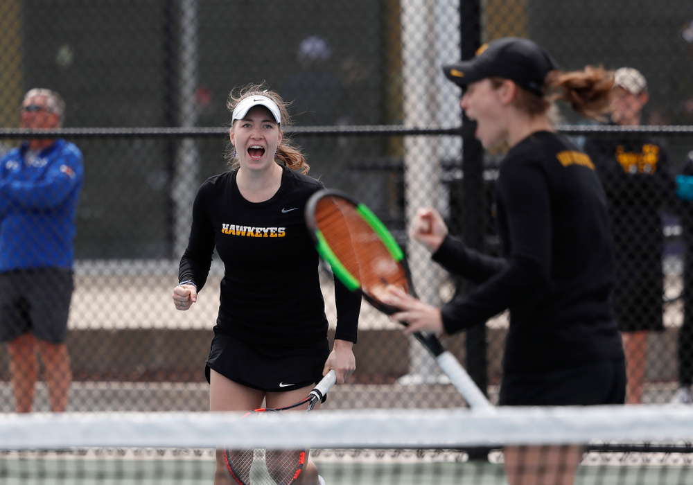 Elise Van Heuvelen and Anastasia Reimchen play a doubles match against the Wisconsin Badgers Sunday, April 22, 2018 at the Hawkeye Tennis and Recreation Center. (Brian Ray/hawkeyesports.com)