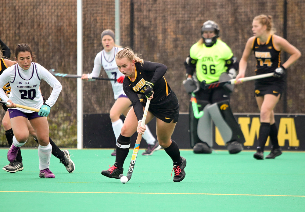Iowa’s Katie Birch (11) moves with the ball during the first quarter of their game at Grant Field in Iowa City on Saturday, Oct 26, 2019. (Stephen Mally/hawkeyesports.com)