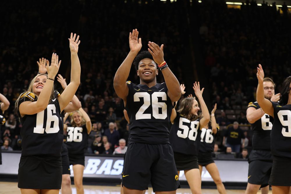 The Iowa Dance Team performs with the Iowa Football Team at halftime of the Iowa Hawkeyes game against the Indiana Hoosiers Friday, February 22, 2019 at Carver-Hawkeye Arena. (Brian Ray/hawkeyesports.com)