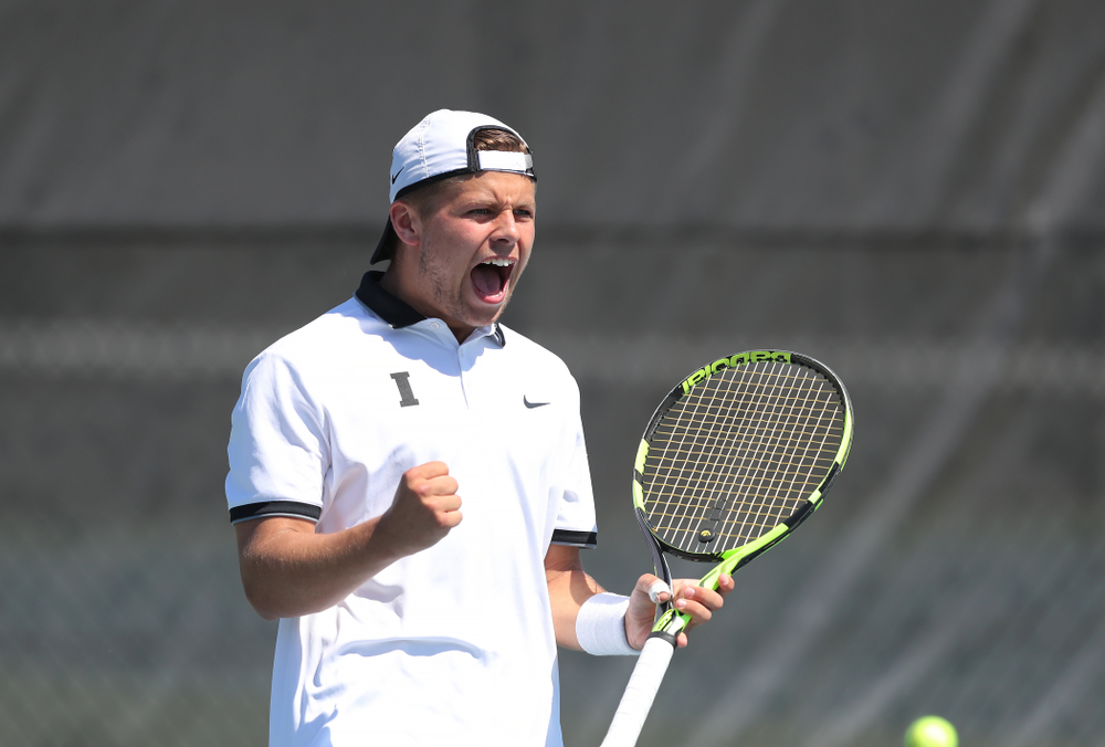 IowaÕs Oliver Okonkwo and Will Davies play a doubles match against the Michigan Wolverines Sunday, April 21, 2019 at the Hawkeye Tennis and Recreation Complex. (Brian Ray/hawkeyesports.com)