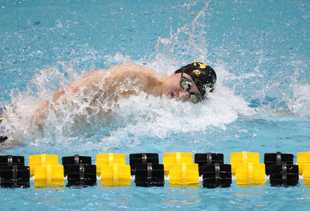 Iowa's Michael Tenney swims the third leg of the 800 freestyle relay at the 2019 Big Ten Swimming and Diving meet Wednesday, February 27, 2019 at the Campus Wellness and Recreation Center. (Brian Ray/hawkeyesports.com)