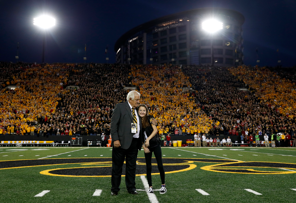 Honorary Captain Tom Moore and Kid Captain Kiersten Mann before the Iowa Hawkeyes game against the Wisconsin Badgers Saturday, September 22, 2018 at Kinnick Stadium. (Brian Ray/hawkeyesports.com)