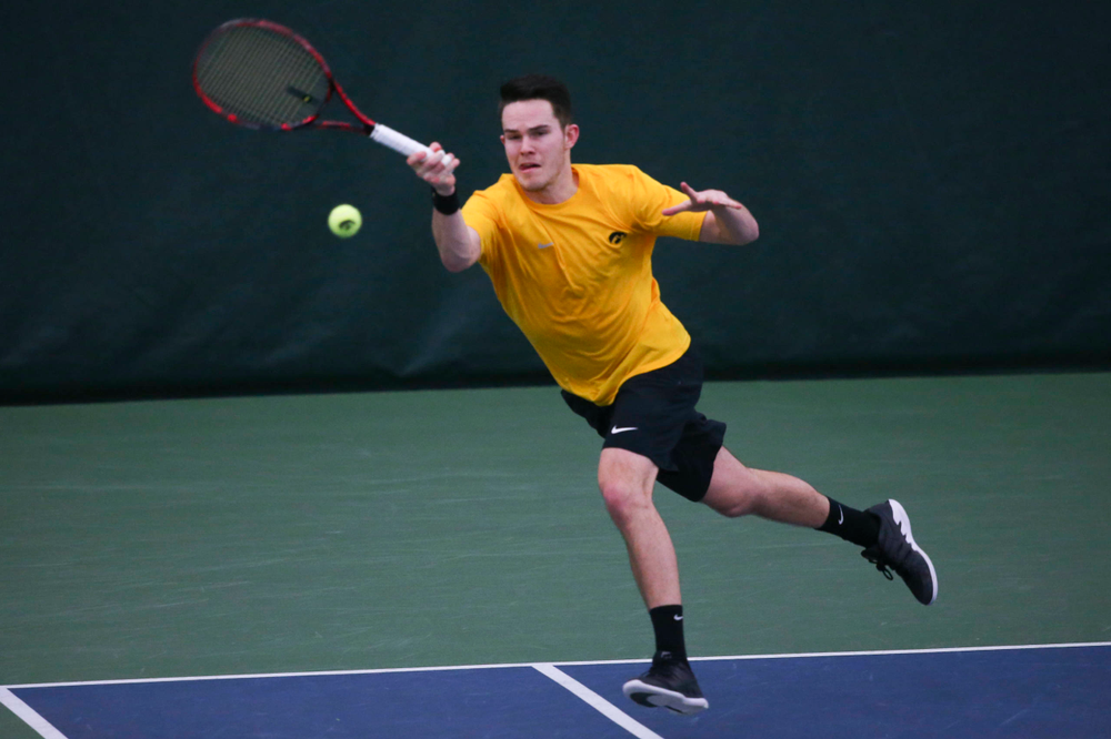 Iowa's Jonas Larsen at a tennis match vs Drake Friday, March 8, 2019 at the Hawkeye Tennis and Recreation Complex. (Lily Smith/hawkeyesports.com)