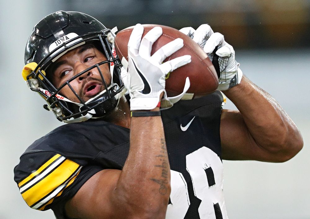 Iowa Hawkeyes running back Toren Young (28) pulls in a pass during Fall Camp Practice No. 6 at the Hansen Football Performance Center in Iowa City on Thursday, Aug 8, 2019. (Stephen Mally/hawkeyesports.com)