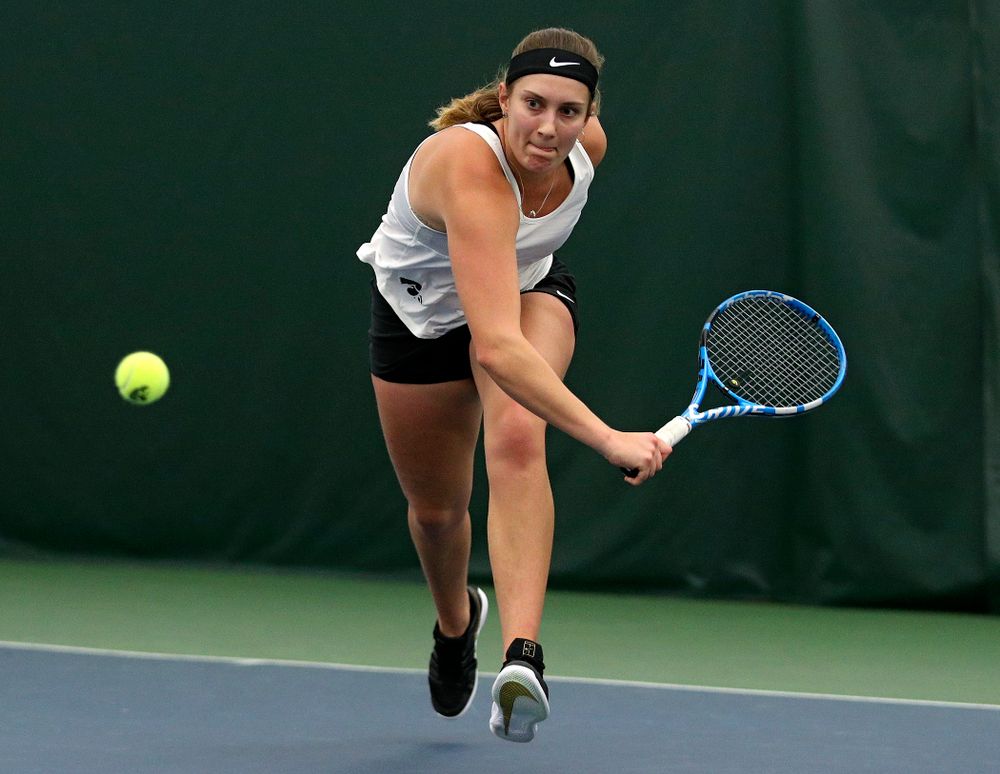 Iowa’s Ashleigh Jacobs returns a shot during her singles match at the Hawkeye Tennis and Recreation Complex in Iowa City on Sunday, February 23, 2020. (Stephen Mally/hawkeyesports.com)