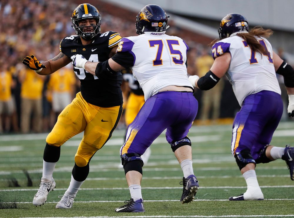 Iowa Hawkeyes defensive end A.J. Epenesa (94) rushes the quarterback during a game against Northern Iowa at Kinnick Stadium on September 15, 2018. (Tork Mason/hawkeyesports.com)