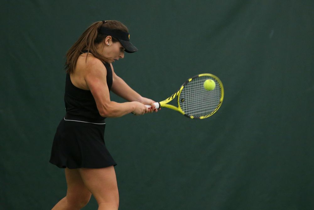 Iowa’s Danielle Bauers returns a ball during the Iowa women’s tennis meet vs UNI on Saturday, February 29, 2020 at the Hawkeye Tennis and Recreation Complex. (Lily Smith/hawkeyesports.com)