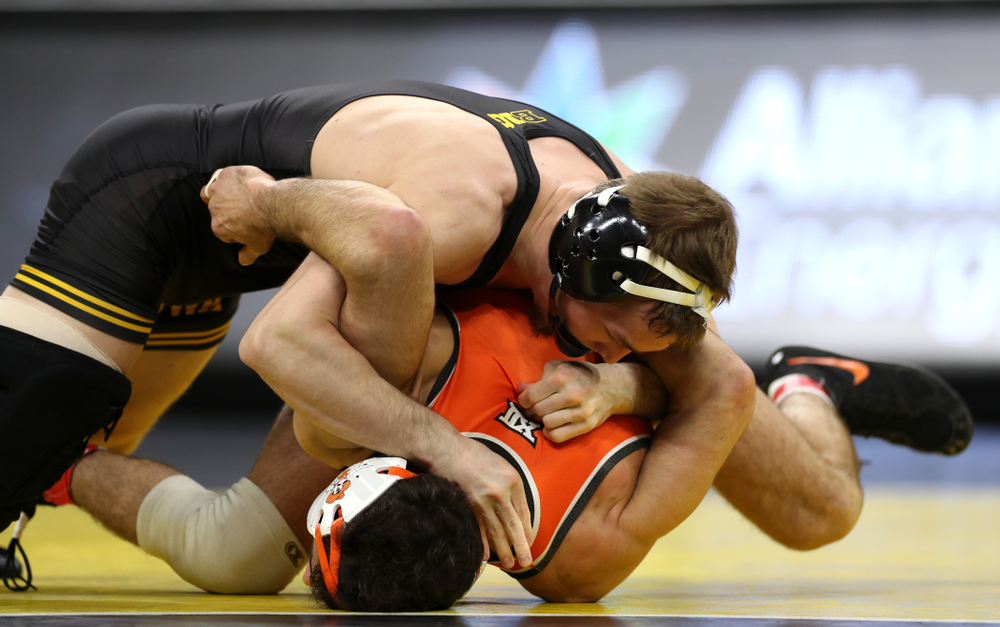 Iowa’s Spencer Lee Wrestles Oklahoma State’s Nick Piccininni at 125 pounds Sunday, February 23, 2020 at Carver-Hawkeye Arena. Lee won the match 12-3. (Brian Ray/hawkeyesports.com)