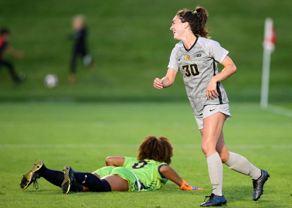 Iowa forward Devin Burns (30) smiles after scoring a goal during the first half of their match at the Iowa Soccer Complex in Iowa City on Friday, Sep 13, 2019. (Stephen Mally/hawkeyesports.com)