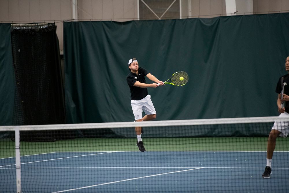 The Iowa men's tennis team competes against Cornell in The Rise Tennis Center in Ithaca, NY on Sunday, Feb. 24, 2019.