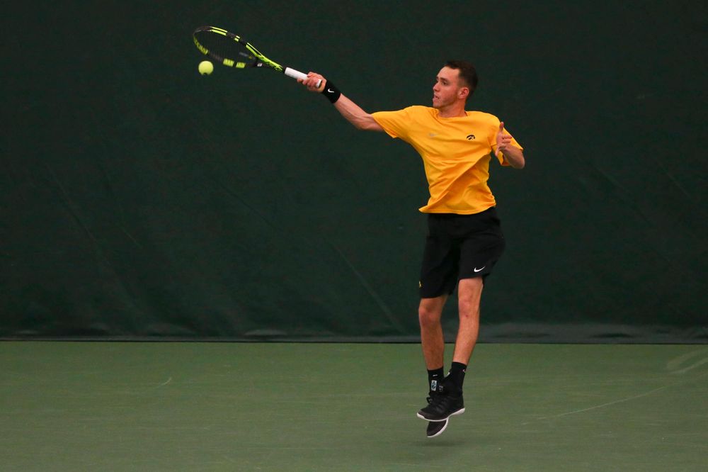 Iowa's Kareem Allaf at a tennis match vs Drake Friday, March 8, 2019 at the Hawkeye Tennis and Recreation Complex. (Lily Smith/hawkeyesports.com)