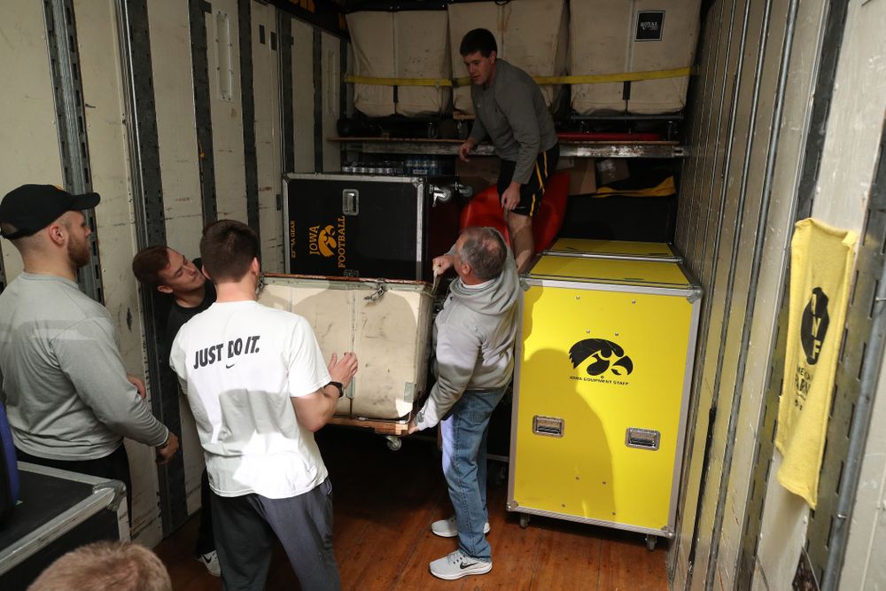 Members fo the Hawkeye Football equipment staff and managers load equipment onto the truck bound for Tampa for the Outback Bowl Wednesday, December 19, 2018 at the Hansen Football Performance Center. (Brian Ray/hawkeyesports.com)