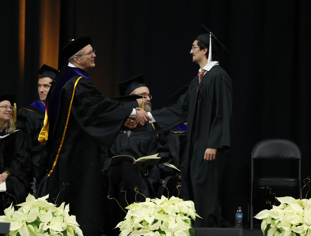 Iowa Football's Miguel Recinos during the Fall Commencement Ceremony Saturday, December 15, 2018 at Carver-Hawkeye Arena. (Brian Ray/hawkeyesports.com)
